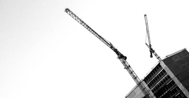 istock Big cranes in the sky 1326766599