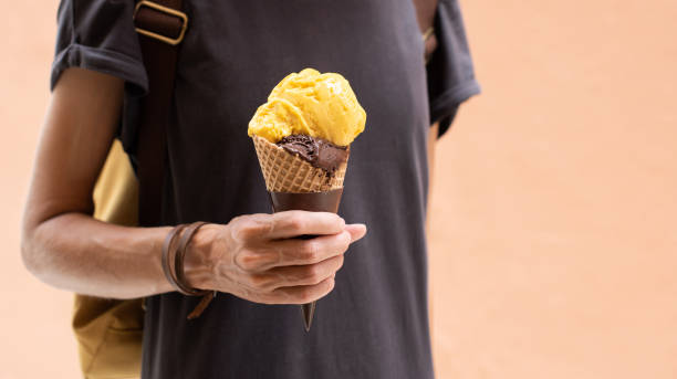 istock Girl holding ice cream, summer fun concept 1326770197