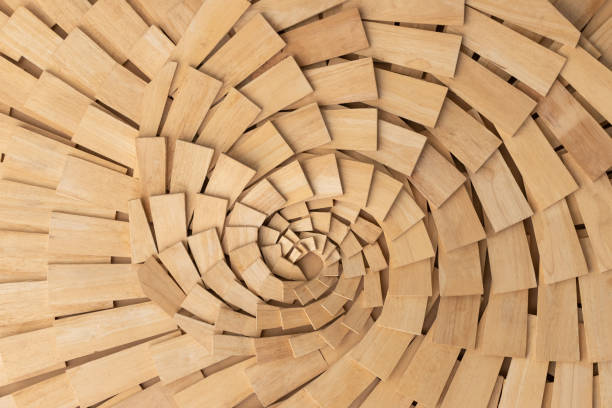 istock small wooden pieces background and texture. spiral timber abstract wall. 1326773440