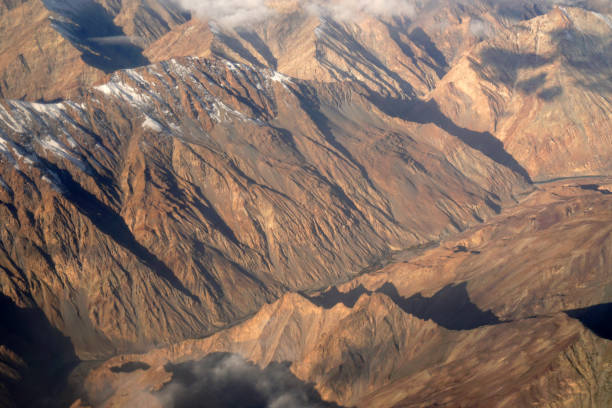 Blurred Nature scene - Aerial top view of Snow Mountain of himalaya mountains on sunny day summer season at Leh Ladakh , Jammu and Kashmir , India  - Beautiful brown  nature Texture Background Blurred Nature scene - Aerial top view of Snow Mountain of himalaya mountains on sunny day summer season at Leh Ladakh , Jammu and Kashmir , India  - Beautiful brown  nature Texture Background stok kangri stock pictures, royalty-free photos & images