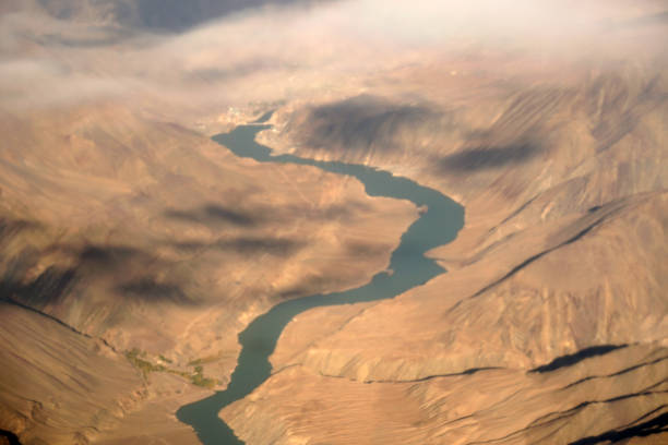 Blurred Nature scene - Aerial top view of River in the hill of himalaya mountains on sunny day summer season at Leh Ladakh , Jammu and Kashmir , India  - Beautiful brown  nature Texture Background Blurred Nature scene - Aerial top view of River in the hill of himalaya mountains on sunny day summer season at Leh Ladakh , Jammu and Kashmir , India  - Beautiful brown  nature Texture Background stok kangri stock pictures, royalty-free photos & images