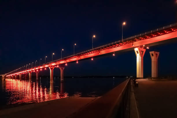 istock Bridge over the river in the evening illumination 1326783118