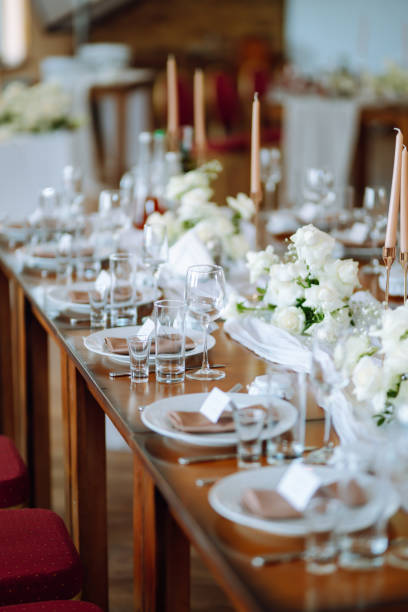 istock Beautiful table setting for a party, wedding reception or other festive event. Banquet setting, glasses, plates. 1326783428