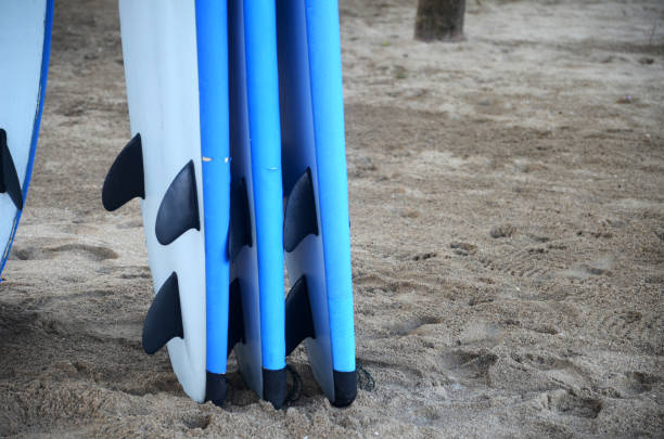 istock Set of surf boards in a stack by ocean in Bali, Indonesia 1326784232