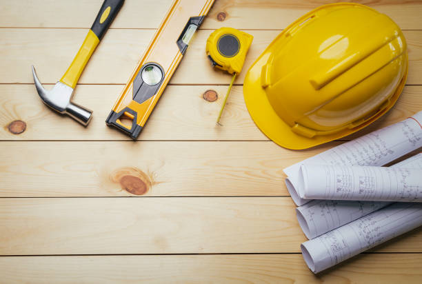 istock Work safety. Standard Construction site protective equipment on  top view wooden background, flat lay, copy space,safety first concepts. 1326790630