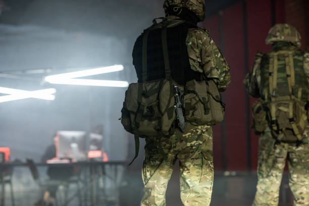 istock Rear view of two men in military uniform 1326792702