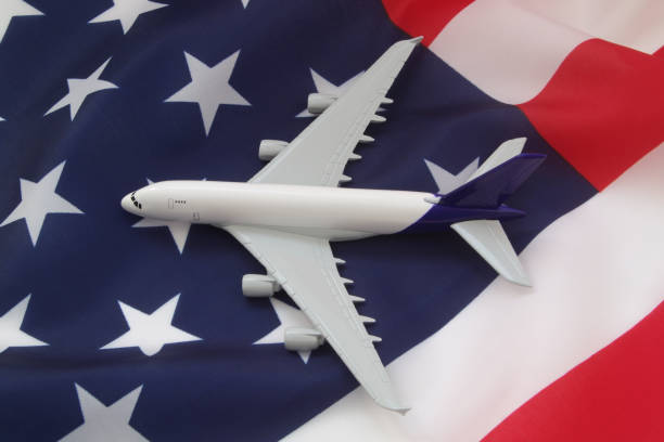 istock Airplane on USA flag. 1326794962