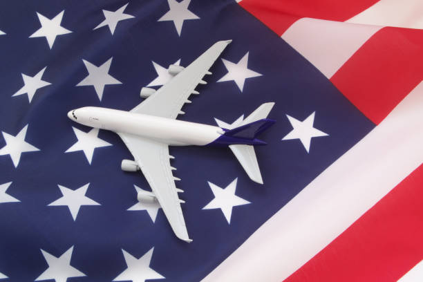 istock Airplane on USA flag. 1326795160