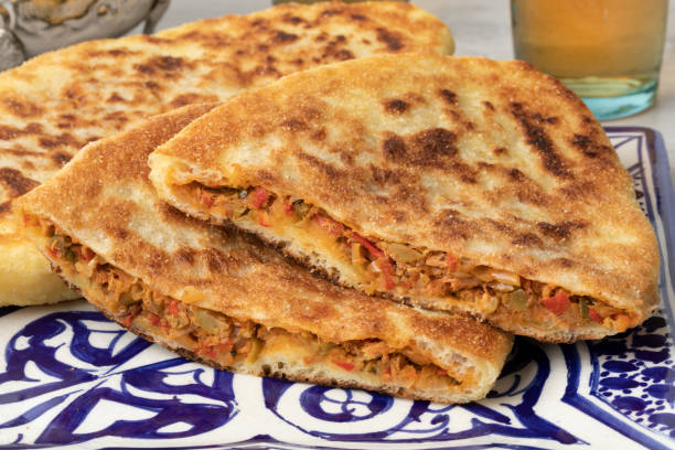 istock Fresh baked Moroccan whole and halved stuffed batbot close up 1326795453