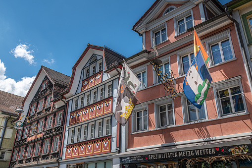 Appenzell, Switzerland - 02.07.2021: buildings in the historic part of the town of Appenzell. The town of Appenzell is the capital of the Swiss canton of Appenzell Innerrhoden, known for its ornamented buildings.