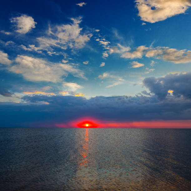 istock early morning sunrise over the quiet sea 1326800634