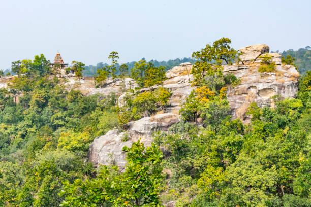 A beautiful landscape view of Ushakothi temple forest from top of mountain. stock photo
