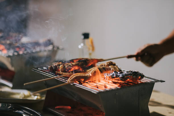 istock A night bbq party gathering with food preparation with chicken wing 1326803606