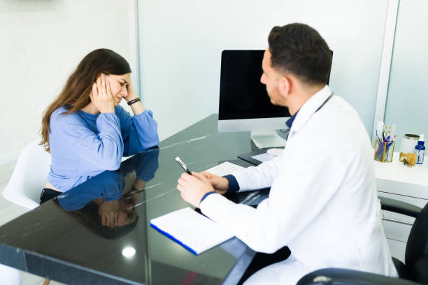 istock Female patient talking about her symptoms 1326804231