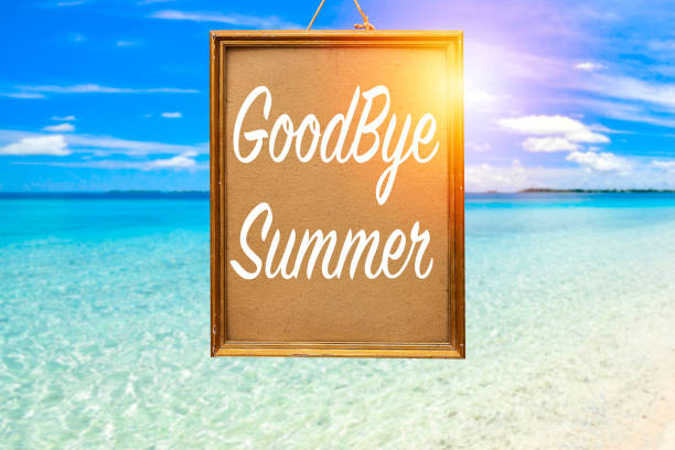 istock goodbye summer concept on gold picture frame with blurred beach view 1326805470