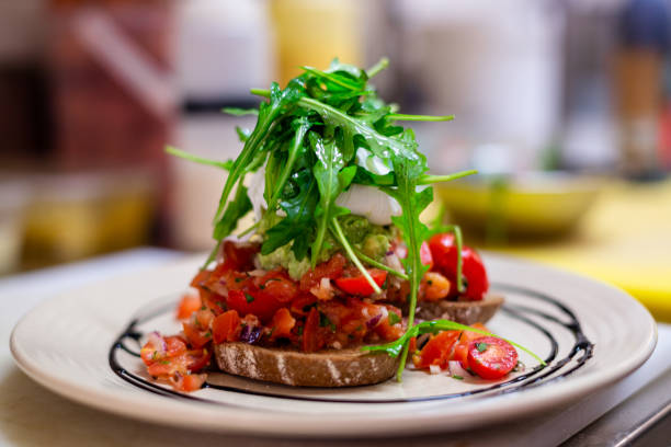 istock Bruschetta with tomato, cheese and rocket salad 1326805714