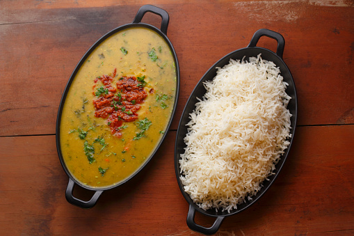 Indian popular food Dal fry or traditional Dal Tadka Curry with Tandoori Roti