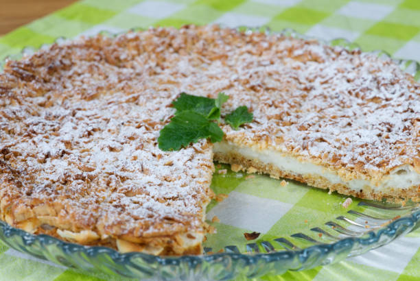 istock Yogurt pie from sprinkled dough with mint leaf on a tray 1326816315