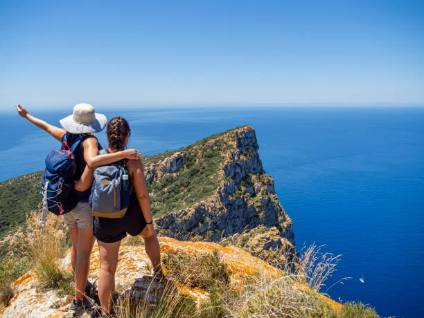 istock Hiking friends on a mountain top 1326824459