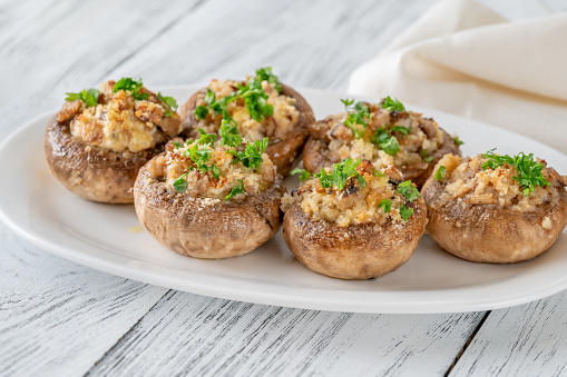 Stuffed mushroom caps with cream cheese, breadcrumbs and parmesan