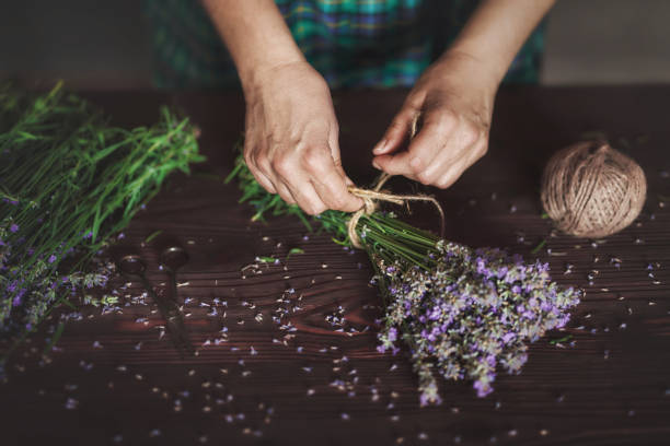 istock Woman arranging lavender bouquet 1326826798