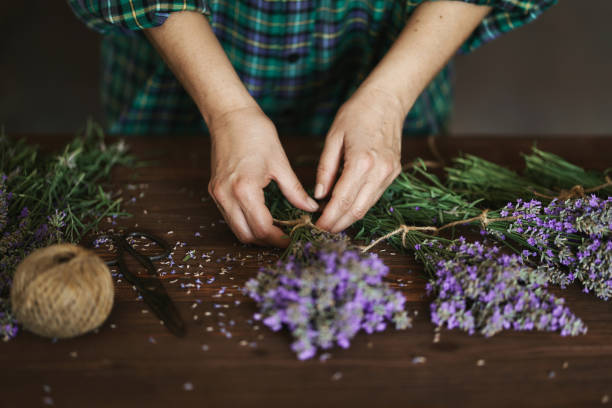 istock Woman arranging lavender bouquet 1326826810