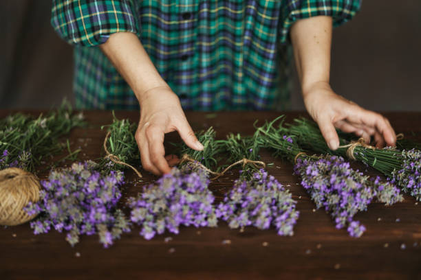 istock Woman arranging lavender bouquet 1326826821