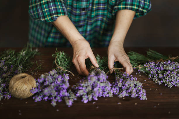 istock Woman arranging lavender bouquet 1326826822