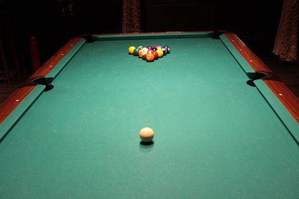 istock Billiard snooker pyramid on green table. American billiards pool on a green table 1326833800