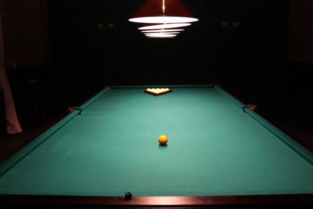 istock Gambling table with russian billiard set and dark cue ball. 1326833832