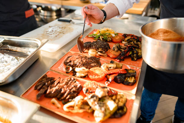 istock view on plates with dish that the chef pours with sauce 1326835606