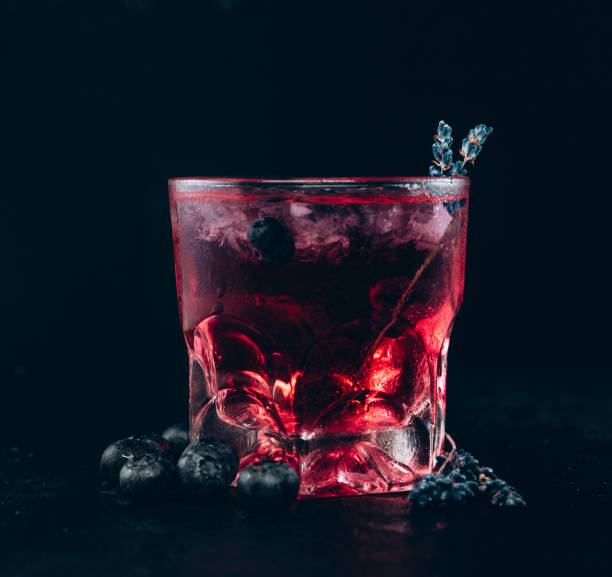 istock Fresh pink vodka cocktail with blueberries 1326839772