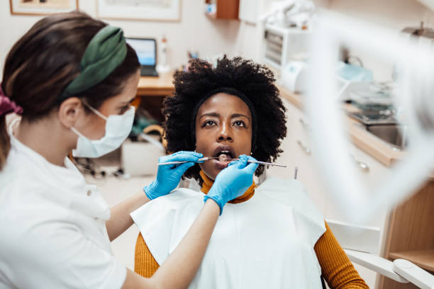 istock Afro American woman visiting dentist 1326841868