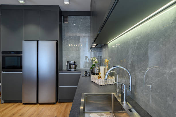 istock Modern large luxury dark gray kitchen closeup 1326842018