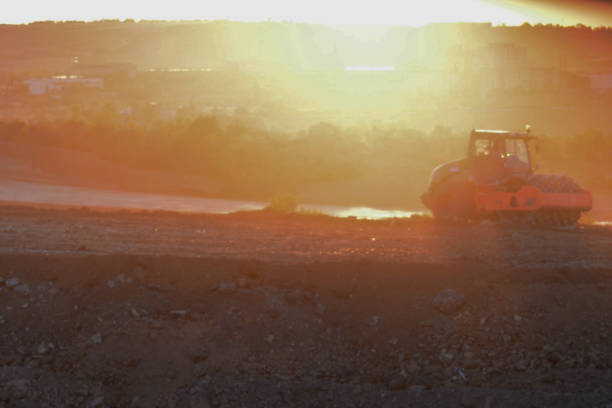 istock road roller asphalt paver  in the sunlight 1326842997
