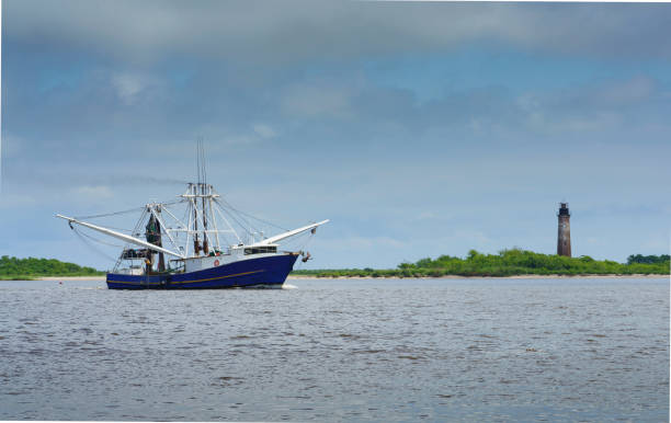 Twenty miles or so from Holly Beach Hwy. 82 ends at the bridge over the Sabine River.  The river marks the boundary between Texas and Louisiana and the river empties into the Gulf of Mexico.  The old lighthouse was completed in 1857 and was deactivated by the Coast Guard in 1952. It is on the National Register of Historic Places, but in very bad repair.