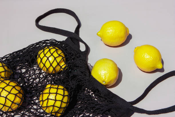 istock Lemons in a black knitted shopping bag 1326845287