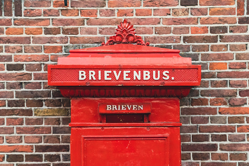 Dutch red mailbox on the wall