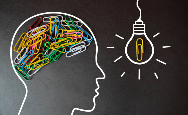 istock Idea concept, Light bulb arrange with colorful pencils on wood table. 1326853632
