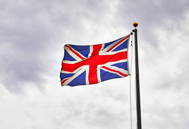 британский флаг на флагштоке - british flag london england flag british culture стоковые фото и изображения