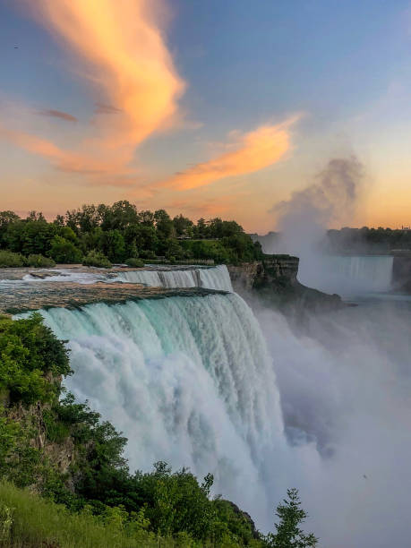 istock Scenic view of three falls at Niagara Falls during sunset 1326868404
