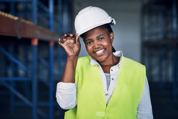 istock Portrait of a confident young woman working a construction site 1326870606