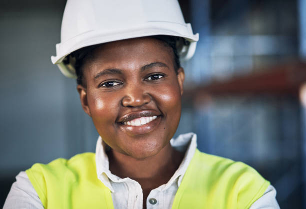 istock Portrait of a confident young woman working a construction site 1326870609