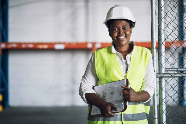 istock Portrait of a confident young woman working a construction site 1326870610