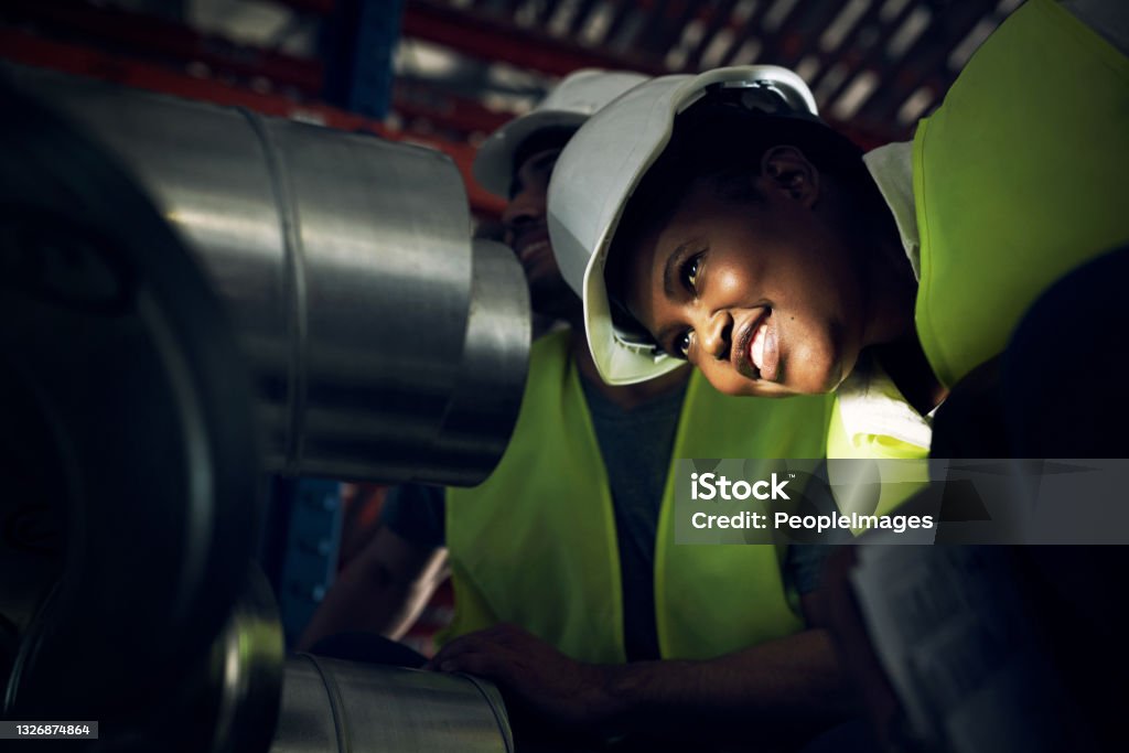 Shot of a young man and woman doing inspections at a construction site Safety inspectors see things a little differently Pipe - Tube Stock Photo