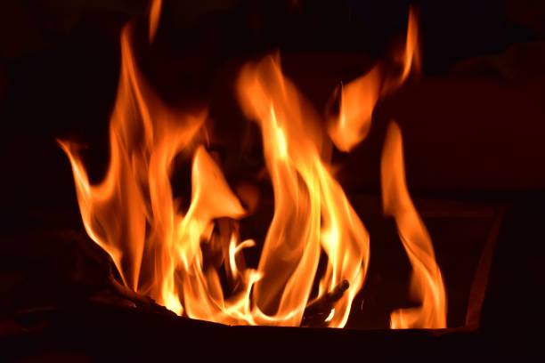 istock Fire flames on black background also known as Hawan Kund in India 1326877703
