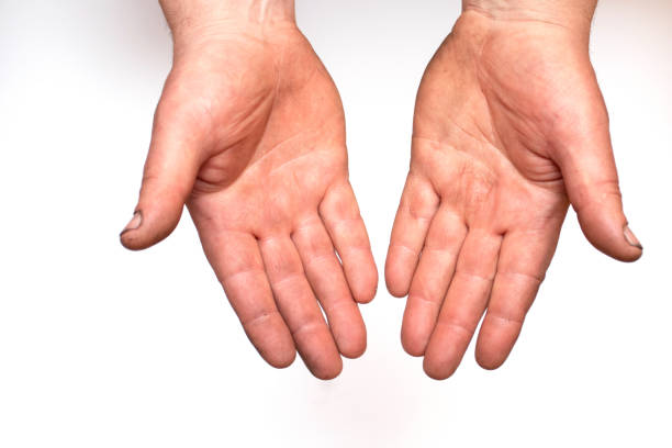 istock Dirty hands of a working man on a white background 1326883078