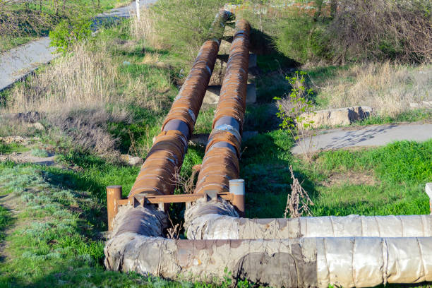 istock Two heating pipes are laid next to the ground. 1326884965