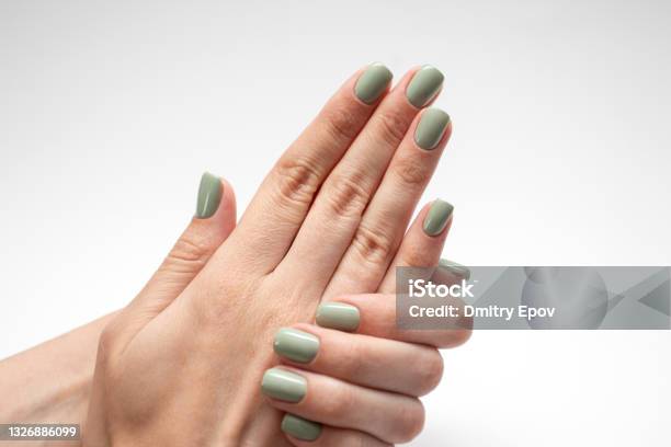 Beautiful Womans Hands With Green Nail Fresh Manicure Isolated On White Background Stock Photo - Download Image Now