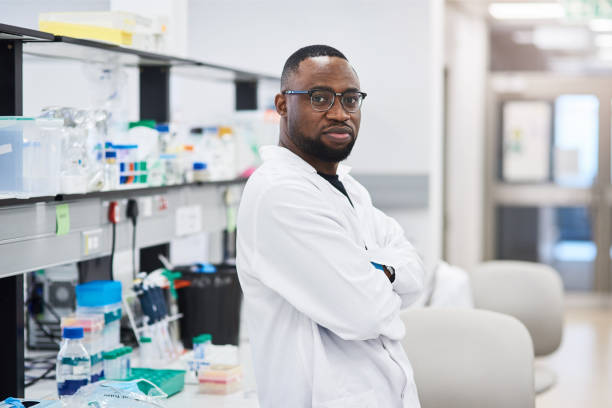 istock Shot of a young male lab technician at work 1326893019